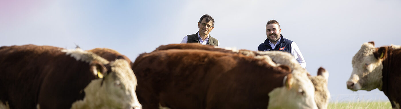 ABP representative with a farmer in a field