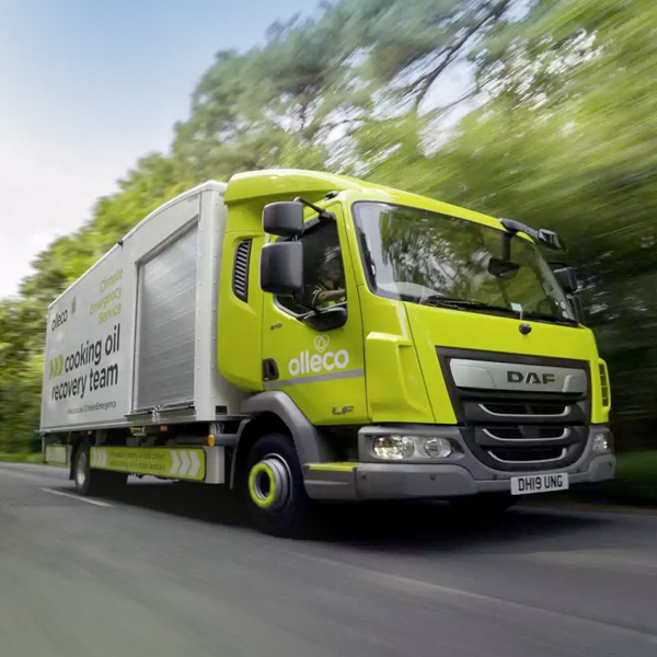 Olleco truck traveling down a road